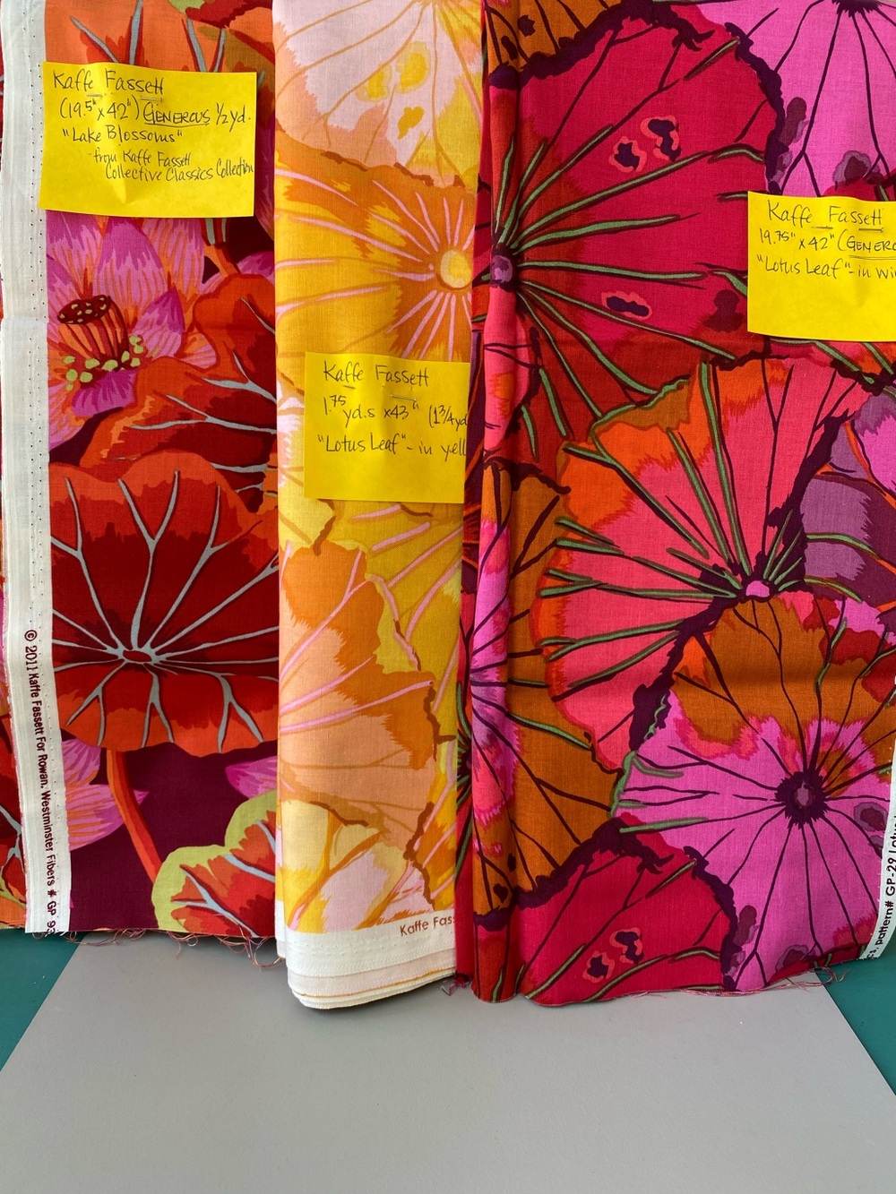 Fassett Fabrics: Lotus Leaf-yellow, Lotus Leaf-red, Lake Blossoms